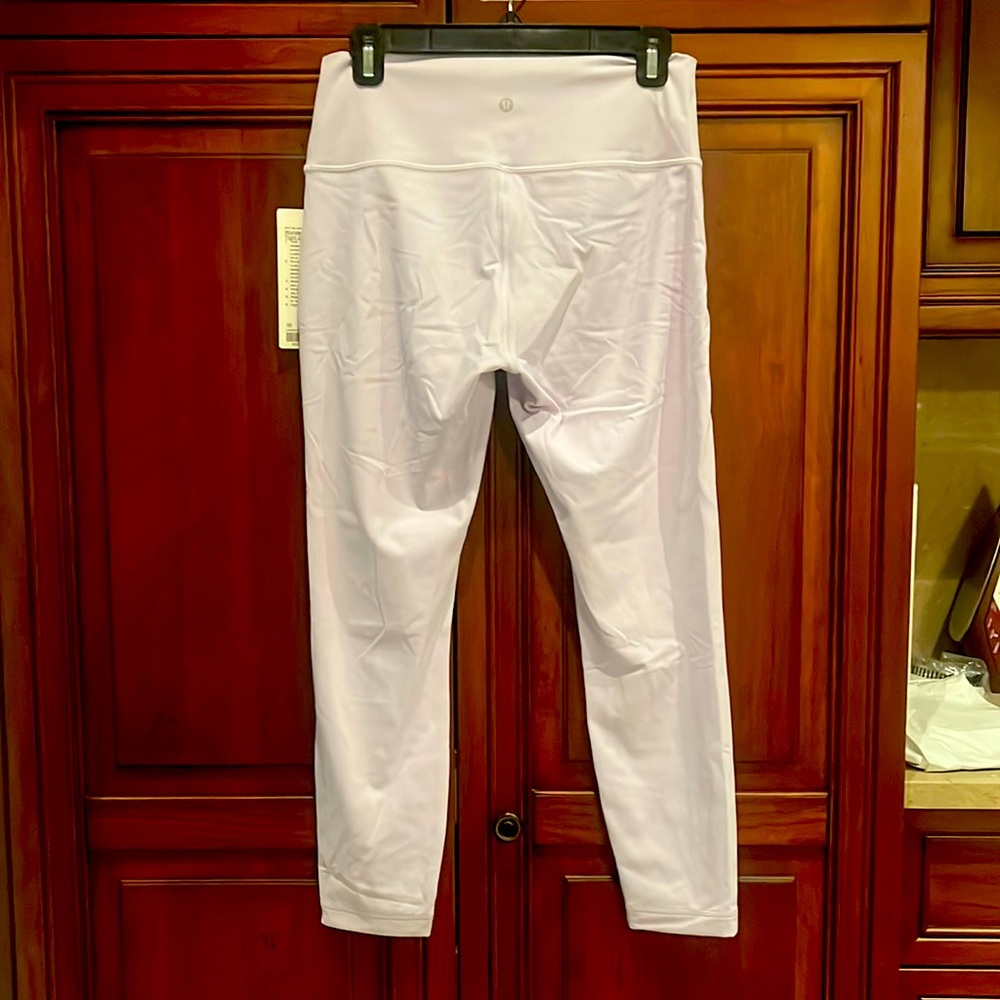 Lululemon leggings, lavender in color . Wunder under HR 25”